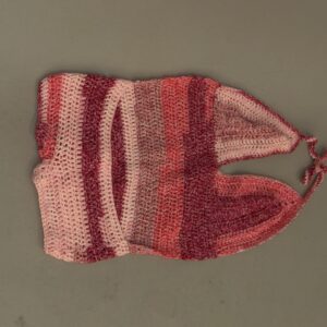 Pink handmade crochet halter jumper with tie neck and short bottom